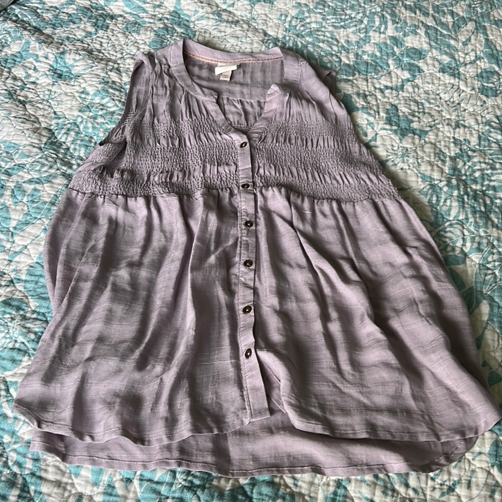 Light purple sleeveless top. NWOT.